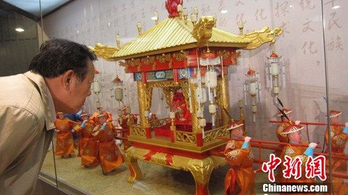 点图查看下一页 天津举办妈祖文化展108个人偶再现皇会盛况
